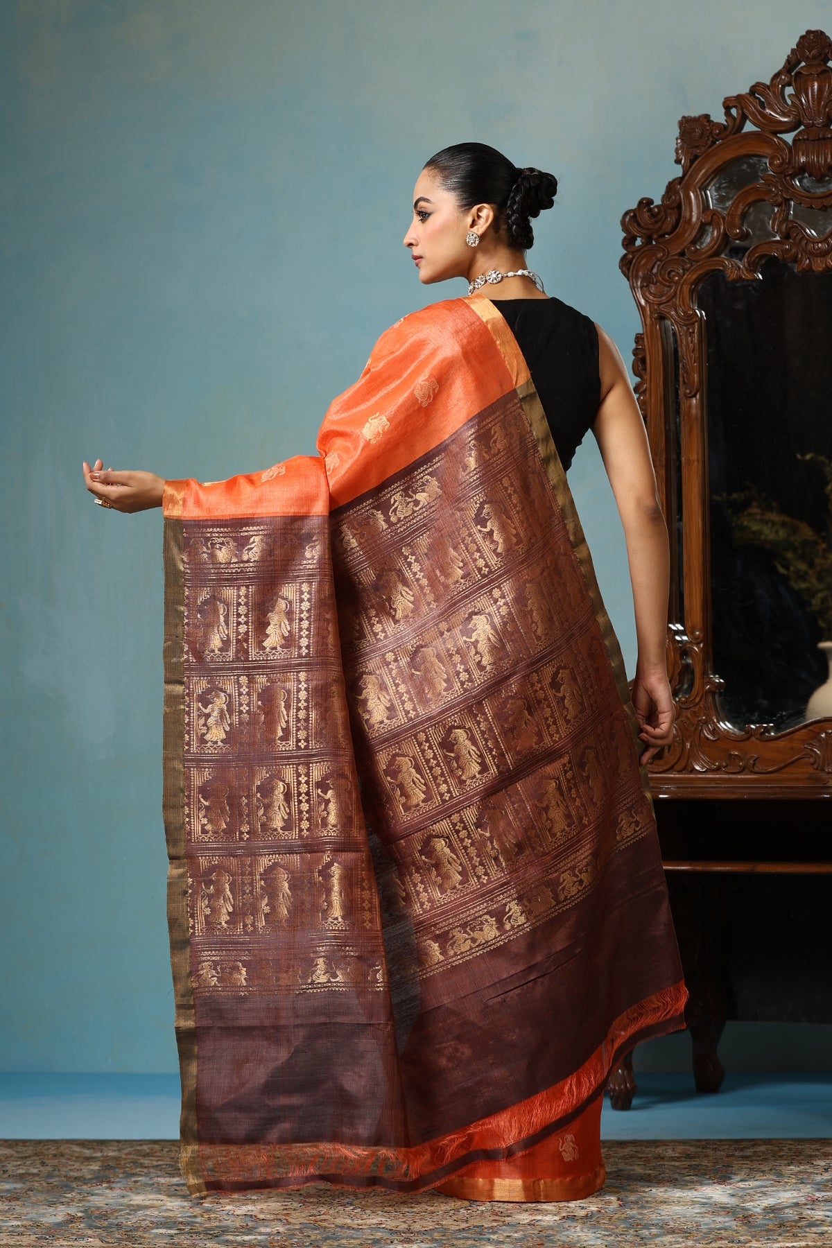 -  Lily handmade vibrant orange Kosa Silk saree with intricate dancer motif design all over