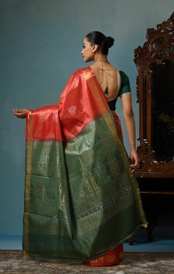 Jasmine handmade vibrant orange Kosa Silk saree with green palla and Chhattisgarhi folk dancer motifs