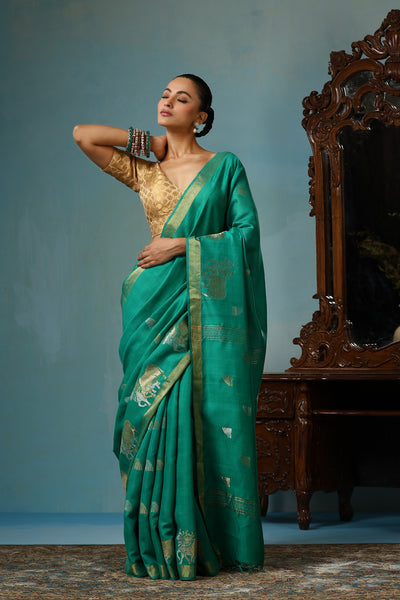 -  Poppy handmade sea green Kosa Silk saree with intricate bail gaadi design