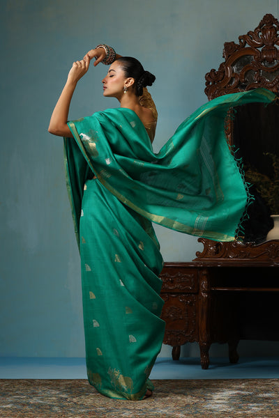 -  Poppy handmade sea green Kosa Silk saree with intricate bail gaadi design