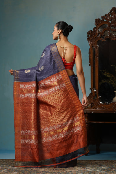 Azalea handmade navy blue Kosa Silk saree with bird motifs and red palla with lotus designs and cows