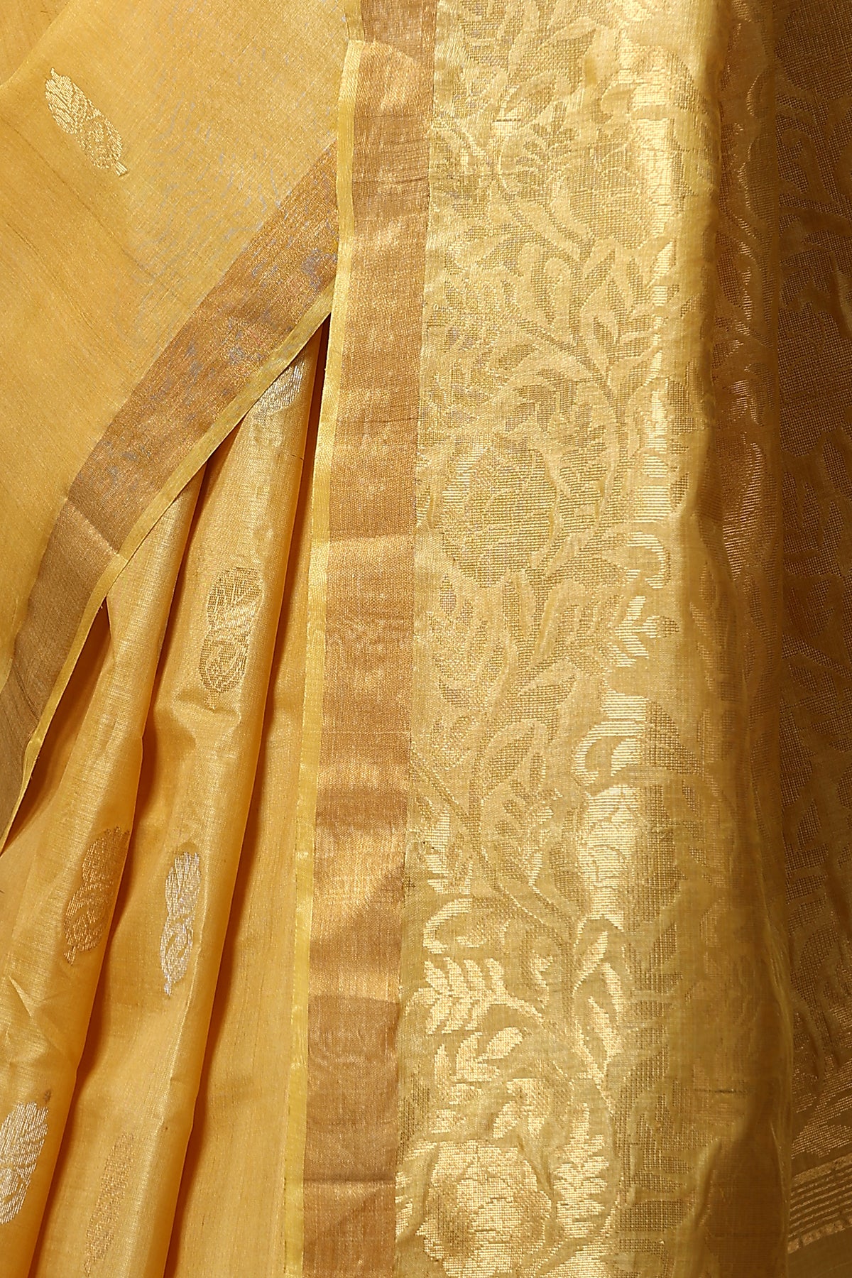-  Marigold handmade light yellow-gold Kosa Silk saree with flower and leaf designs on the palla